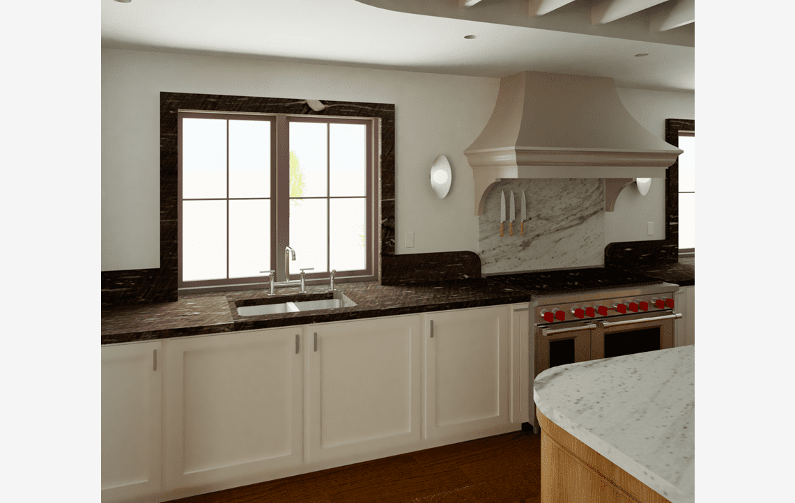 A kitchen with white cabinets and black counter tops.