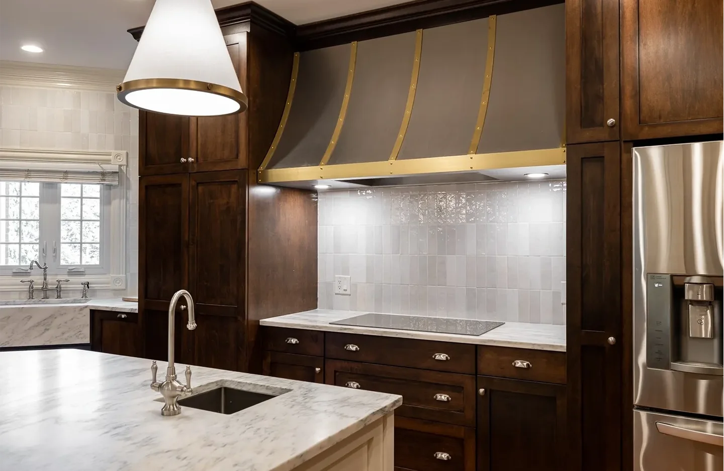 A kitchen with a sink and a stove