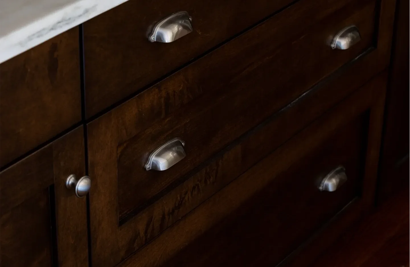 A close up of the handles on drawers