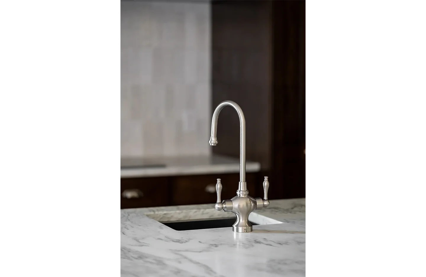 A white sink sitting on top of a counter.