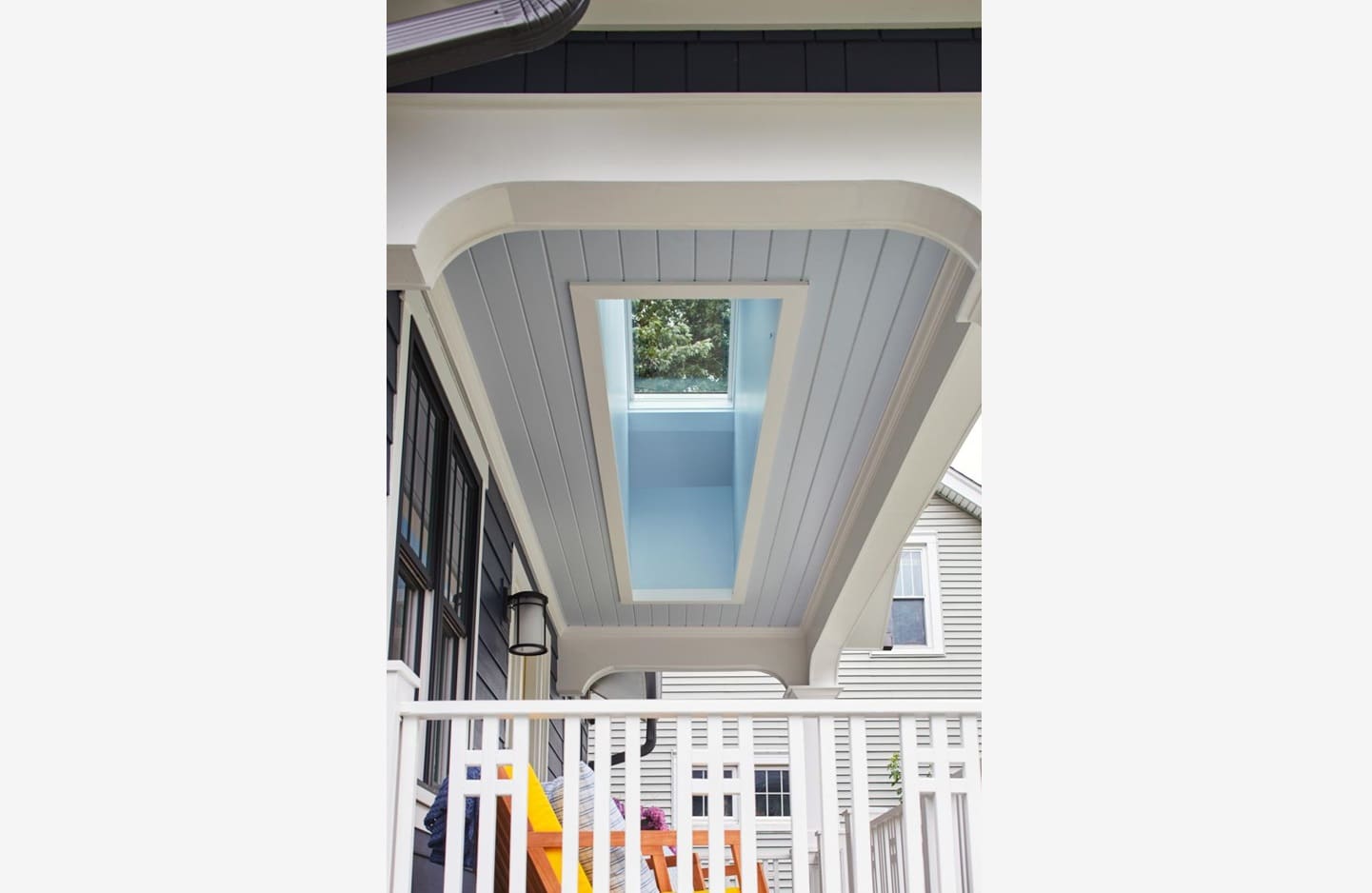 A skylight in the center of an outdoor deck.