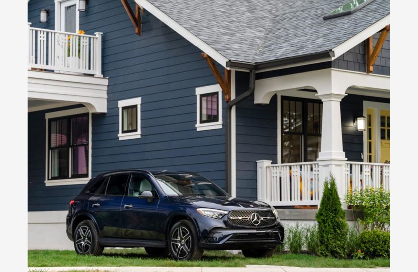 A car parked in front of a house.