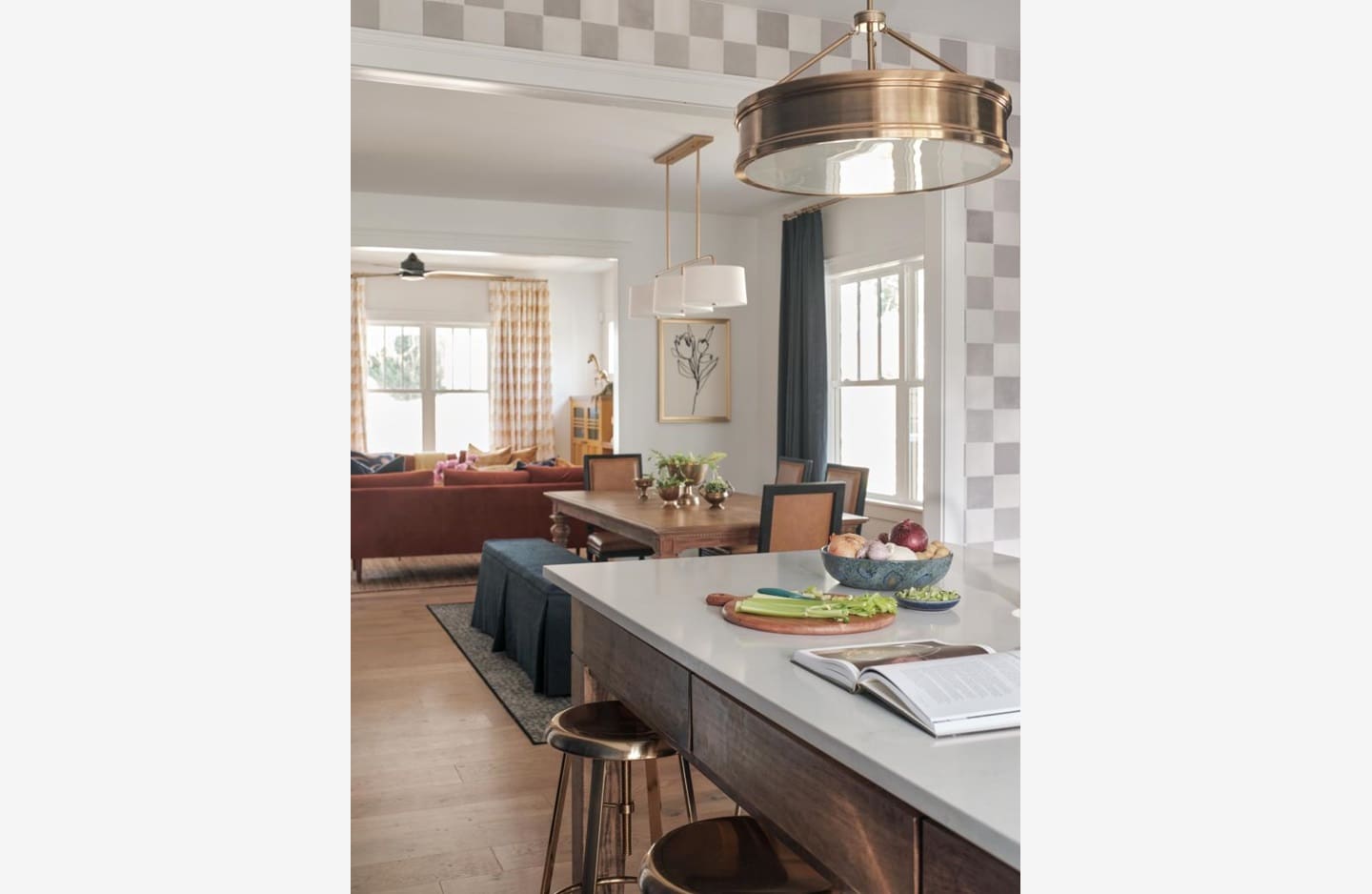 A kitchen with a table and chairs in it